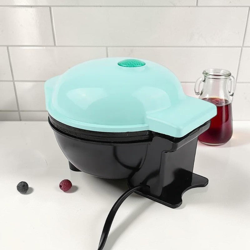 Máquina para hacer cuencos de gofres RIVETI, mini gofrera azul, compacta y fácil de usar para desayunos y postres creativos.